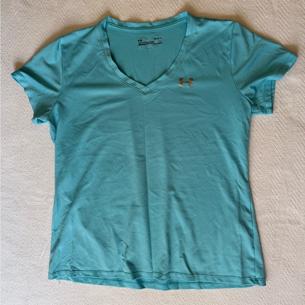 Women’s Under Armor light blue athletic shirt